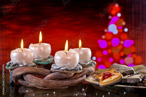 Advent Wreath with Burning Candles onteh Red Background