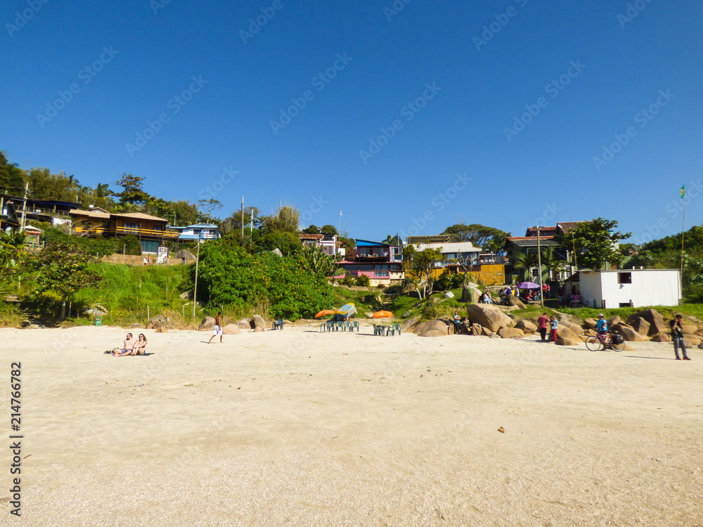 Florianopolis, Brazil - Circa July 2018: People enjoying a sunny day at Prainha da Barra, small beach near Barra da Lagoa