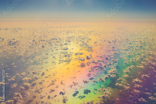 aerial panoramic cloudscape over sea in colorful reflection light photo