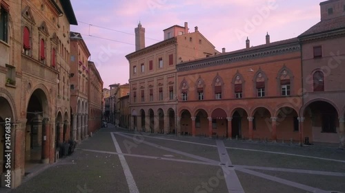 bologna city skyline aerial shot at sunrise flying backwards