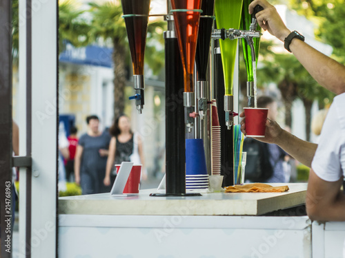 summer open air bar faucet drinks in the city street party