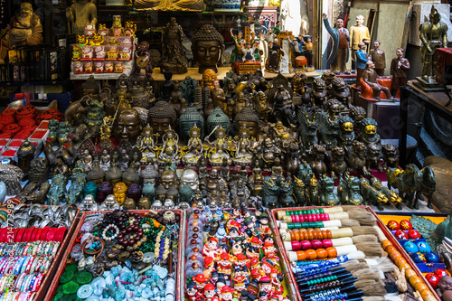 Selection of Chinese statues and souvenirs displayed in a gift shop at the Cat Street, Hong Kong, Sheung Wan
