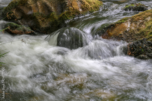 Fototapeta Naklejka Na Ścianę i Meble -  Water rushing over rocks 