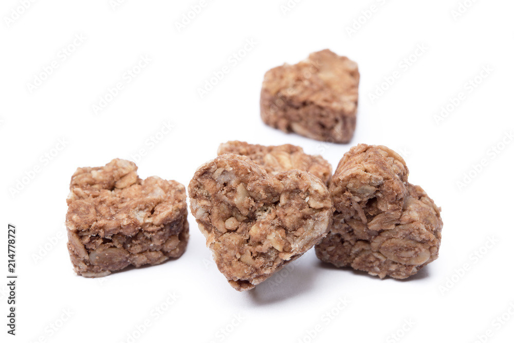 Oatmeal heart dessert isolated on white background