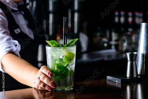 Cold fresh Mojito cocktail on the bar counter