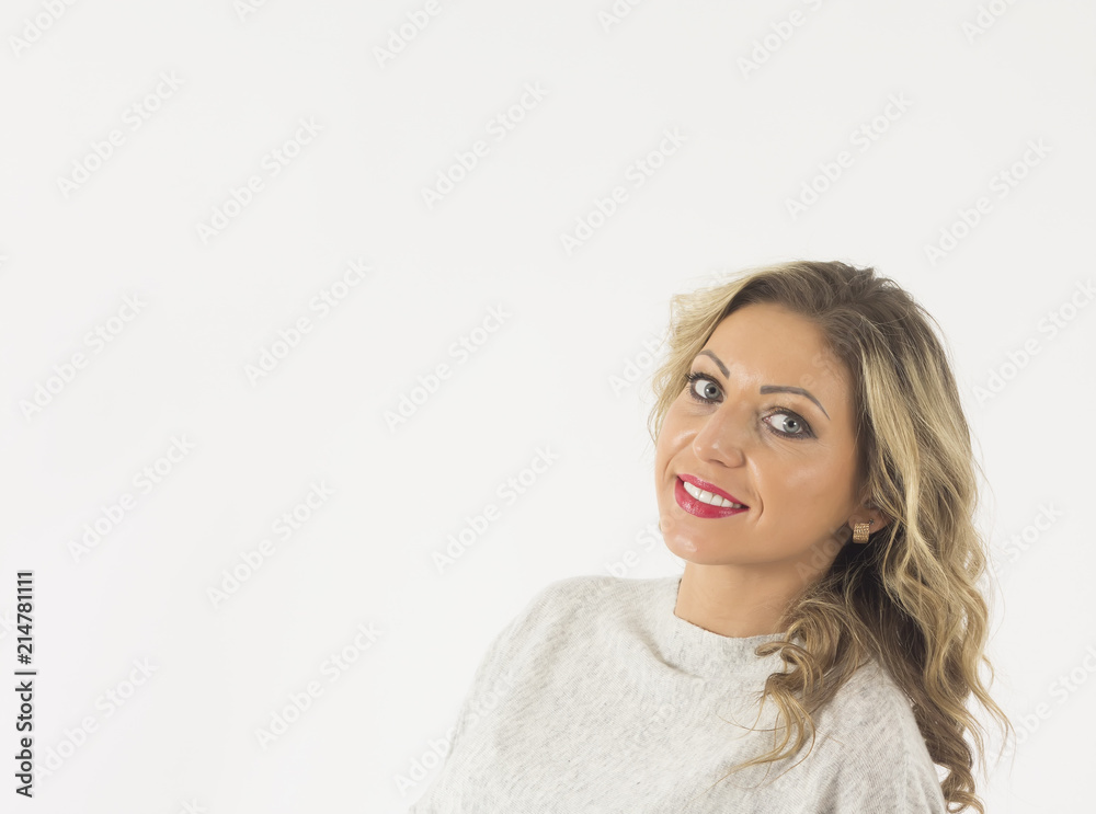 Blonde beautiful woman isolated on white background. White teeths, space for text Blonde beautiful woman isolated on white background. White teeths, space for text