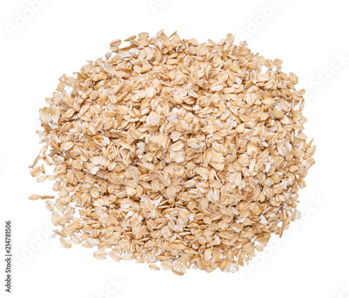 Heap of raw oat flakes isolated