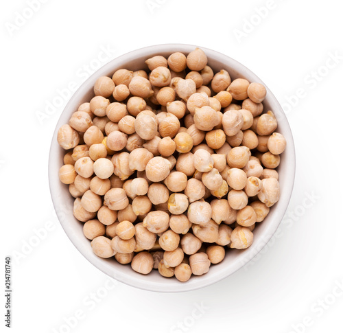 Grains of chickpea in plate, isolated on white