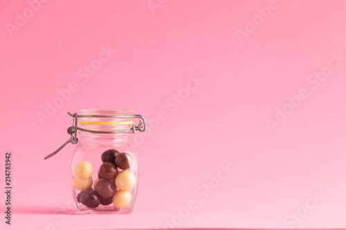 jar with black and white chocolate balls