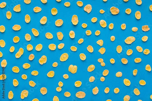 Yellow flakes pattern on blue background