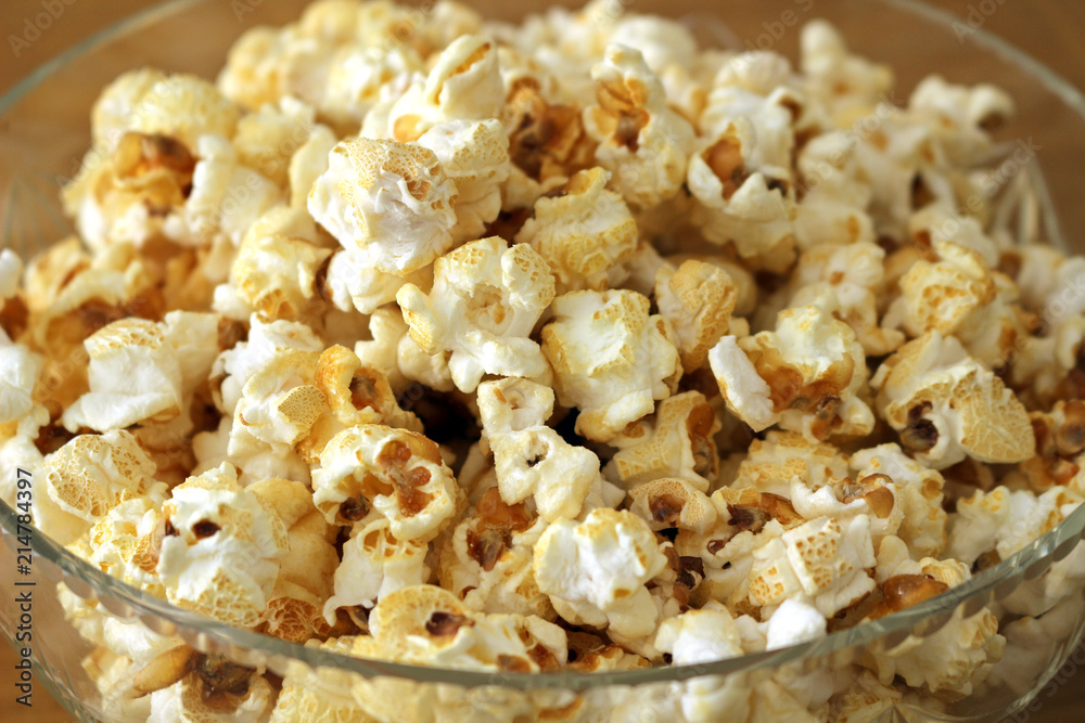 Close up of cooked popcorn in a glass bowl