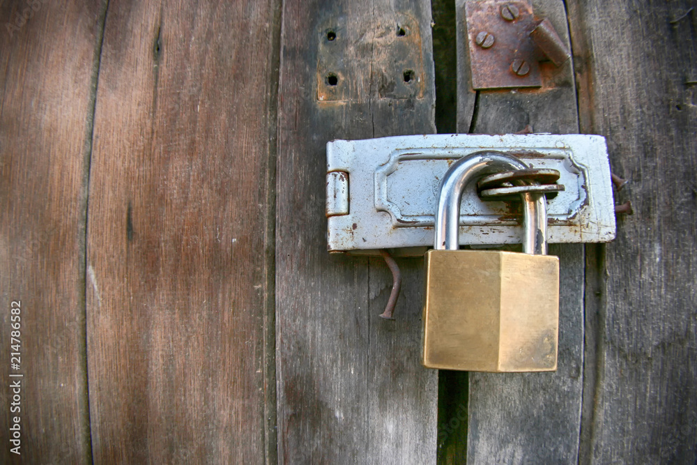 A lock on the door , wall
