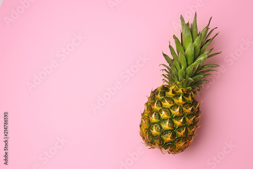 Delicious pineapple on color background