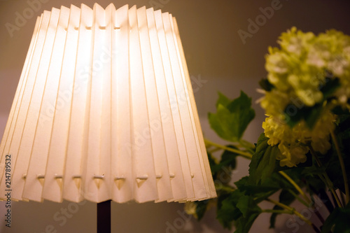 White lampshade corrugated colorful, decorative, electric, lighting. Interior design of the lamp abstract. photo