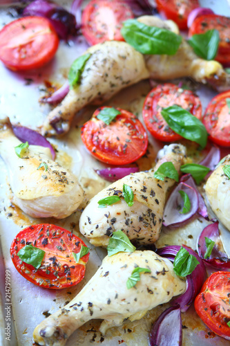 Chicken dinner on sheet pan with basil