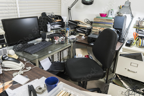 Messy business office desk ...