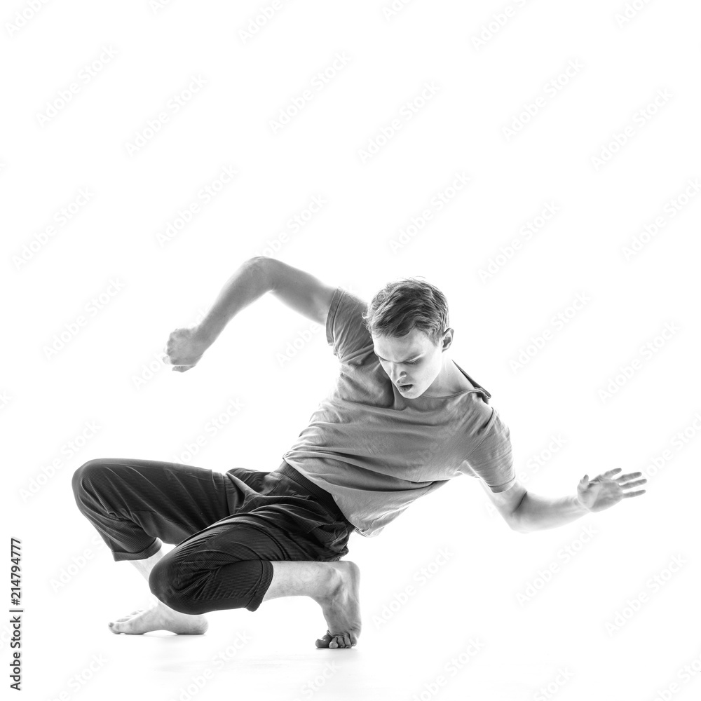 Young beautiful dancer is posing in studio Young beautiful dancer is posing in studio
