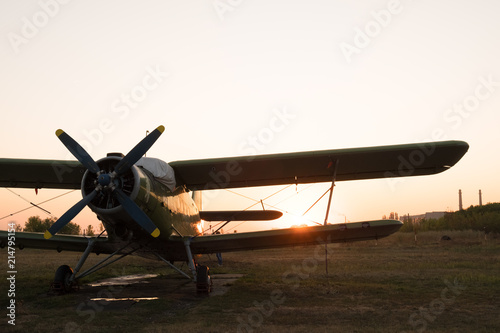 light small sports airplane on the field of the flying club of the parachutists on a summer sunny morning