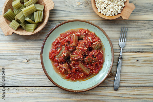 cardi o cardoni in salsa di pomodoro e tofu con spezie varie  photo