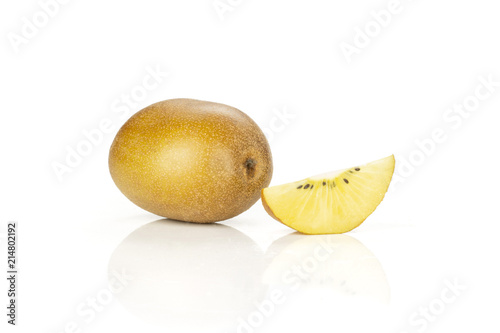 Group of one whole one slice of fresh golden brown kiwi fruit sungold variety isolated on white photo