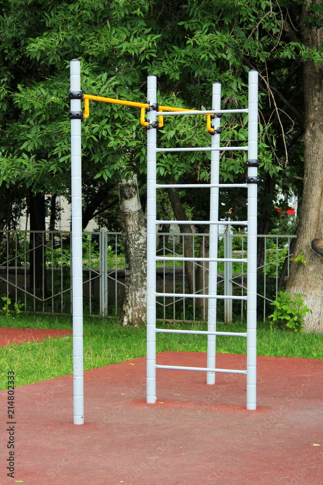 Fototapeta premium Outdoor sport simulator. Street workout exercise.
