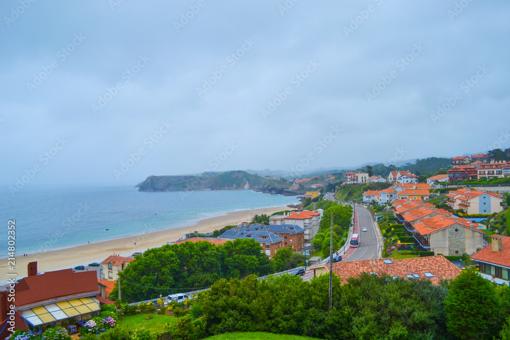 View of beach and town of Comillas from Guell and Martos park. Nice sightseeing. Comillas, Cantabria, Spain