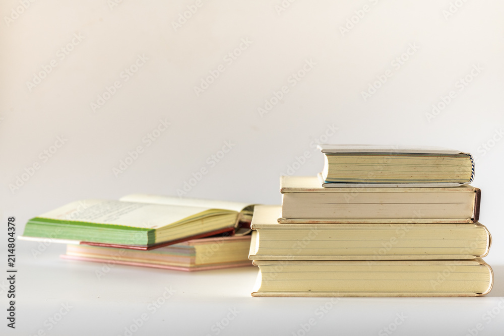 Stack of old books isolated on white background. 