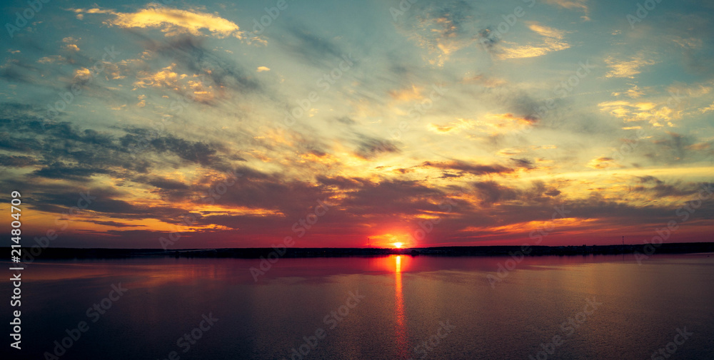 Aerial panoramic view of sunset on the lake