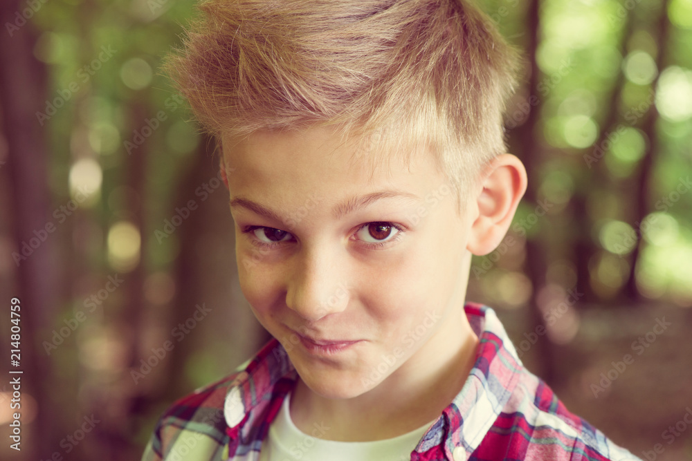 Portrait of an attractive young teenager in the schoolyard Portrait of an attractive young teenager in the schoolyard