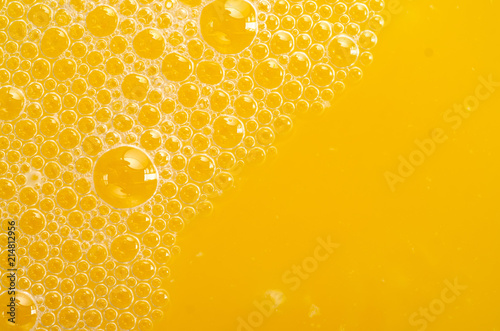 Orange juice bubbles macro texture health fresh photo