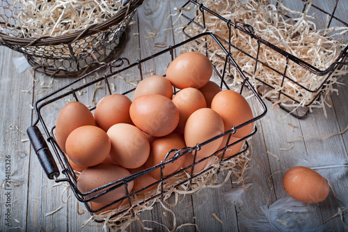 Visual metaphor/proverb: Don't put all of your eggs in one basket with whole eggs
