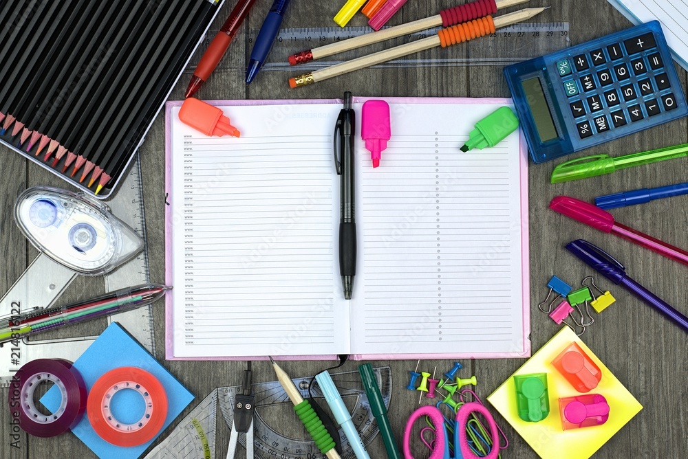 Back to school concept: office and school tools with a calendar on a wooden background. Back to school concept: office and school tools with a calendar on a wooden background.