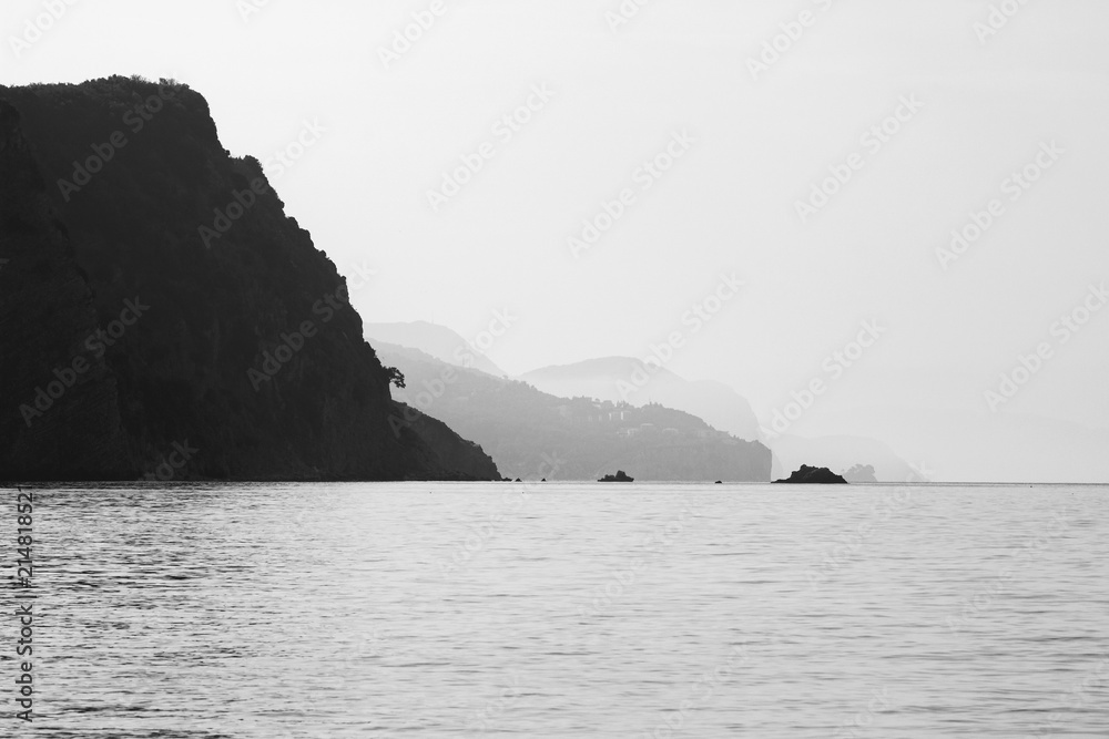 Adriatic sea coastline in haze, dramatic black and white landscape Adriatic sea coastline in haze, dramatic black and white landscape