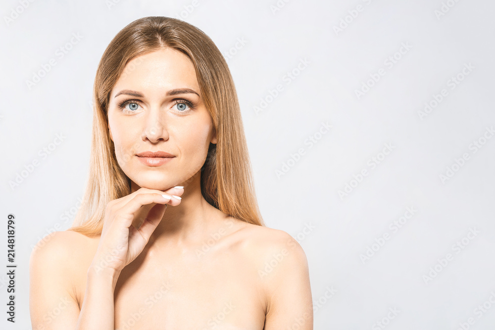 Beauty Woman face Portrait. Beautiful Spa model Girl with Perfect Fresh Clean Skin. Blonde female looking at camera and smiling. Youth and Skin Care Concept Beauty Woman face Portrait. Beautiful Spa model Girl with Perfect Fresh Clean Skin. Blonde female looking at camera and smiling. Youth and Skin Care Concept