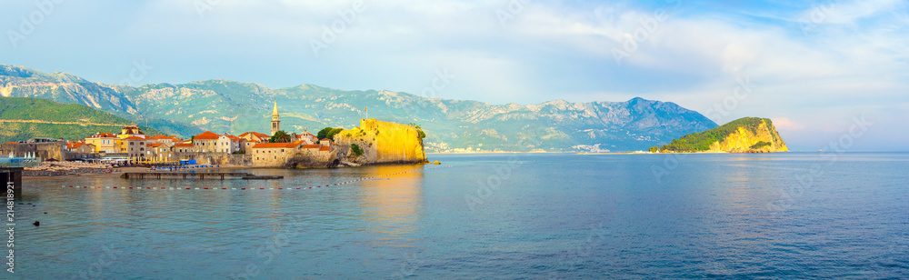 Panoramic view to the old city Budva and Sveti Nikola island on Adriatic sea coastline at Montenegro. summer seascape background