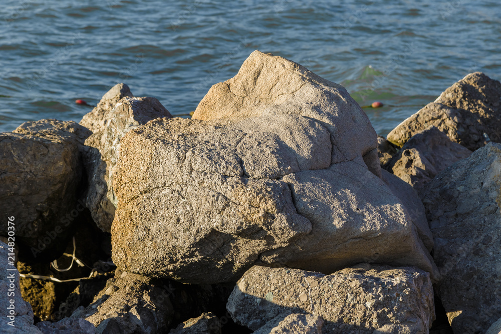 Sea waves are fighting against the big rocks on the shore. Sea waves are fighting against the big rocks on the shore.
