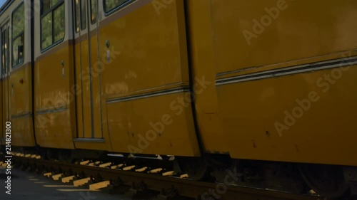 Famous tram line near Danube River passing in afternoon sun in Budapest, Hungary.
