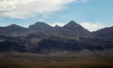 Landscape of a desert mountain range on a hot, dry day