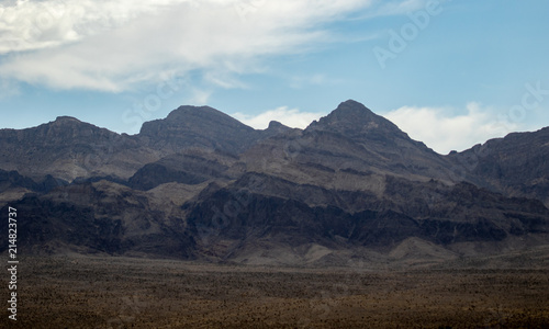 Landscape of a desert mountain range on a hot, dry day © Boyce