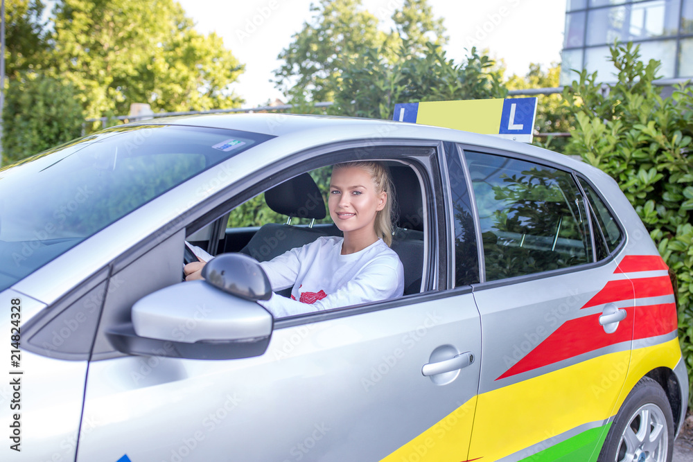Driving student sitting in a car