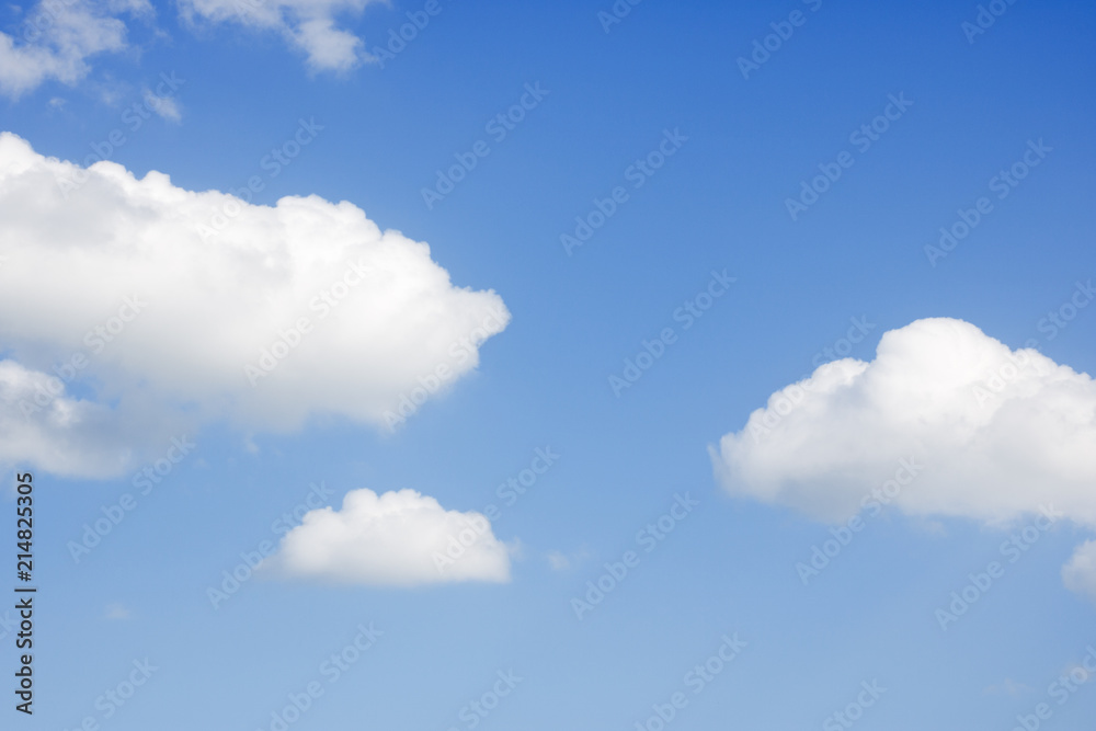 blue sky, covered with white clouds on a warm summer day