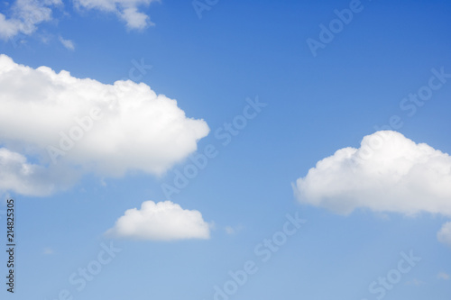 blue sky  covered with white clouds on a warm summer day