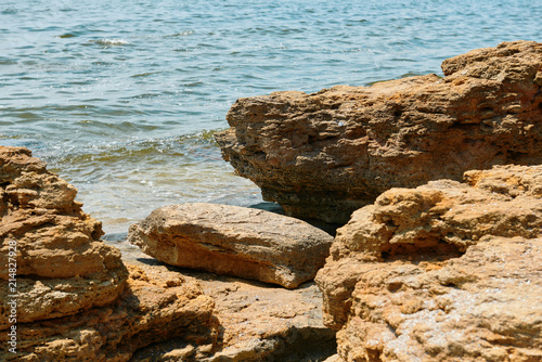 stones on the beach, beautiful sea summer landscape, wild beach closeup © soleg