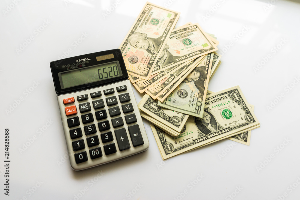 Close-up Money and Calculator, American Dollar Banknotes Close-up Money and Calculator, American Dollar Banknotes