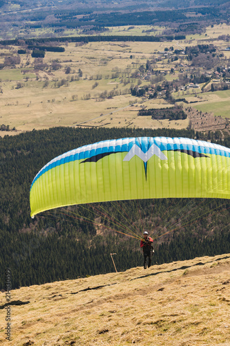 Parachutist Jumper in the blue sky
