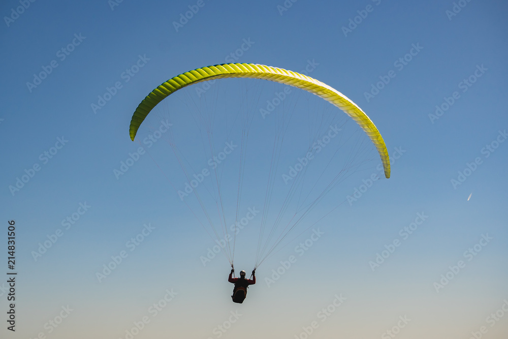 Parachutist Jumper in the blue sky Parachutist Jumper in the blue sky