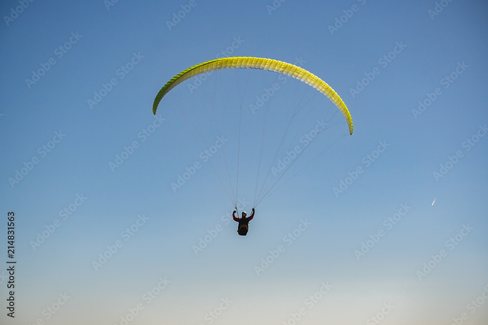 Parachutist Jumper in the blue sky Parachutist Jumper in the blue sky