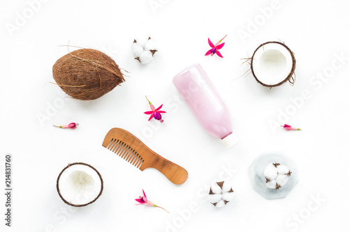 Hair care composition. Coconut, brush, scissors on white background, flat lay, top view