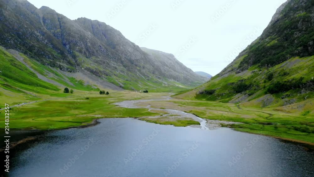 Flight over the awesome landscape of Glencoe in the Highlands of Scotland