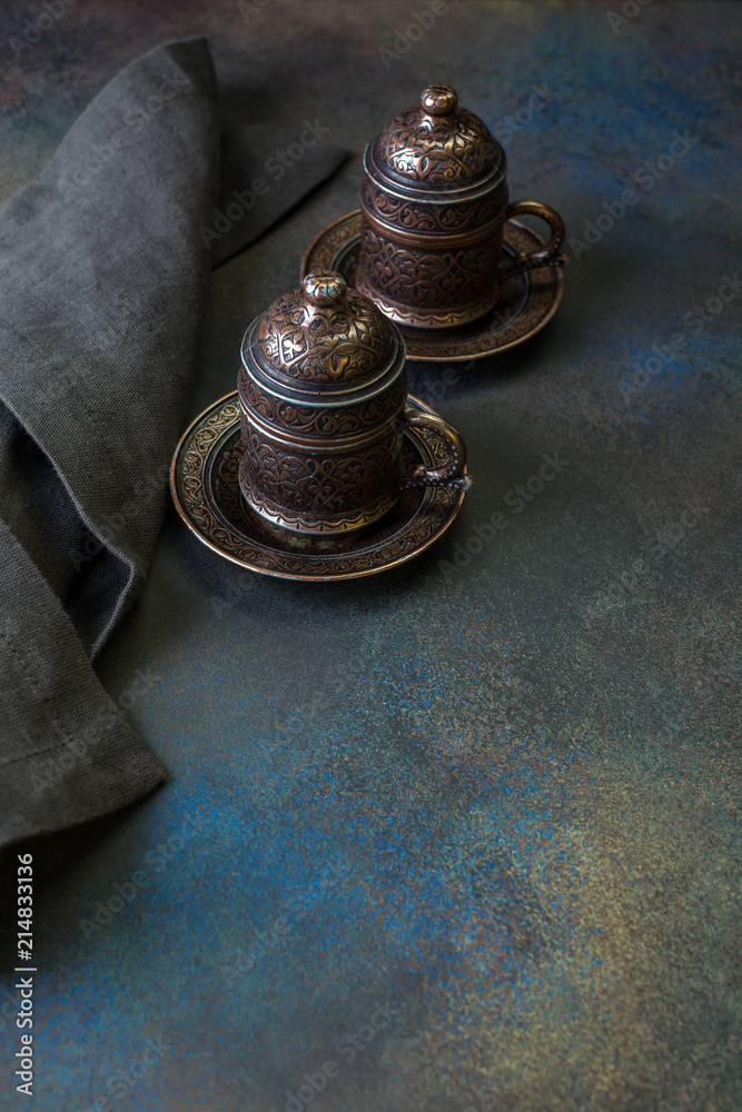 Turkish Coffee on the Dark Background Retro Style Two Bronze Cups Turkish Coffee on the Dark Background Retro Style Two Bronze Cups